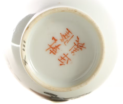 Chinese Porcelain Vase with Snake Charmer Design